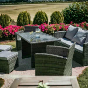 outdoor lounge rattan set with cushions and poufs