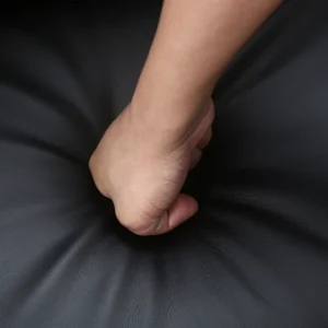 Modern black leather recliner sofa three seats detail close-up